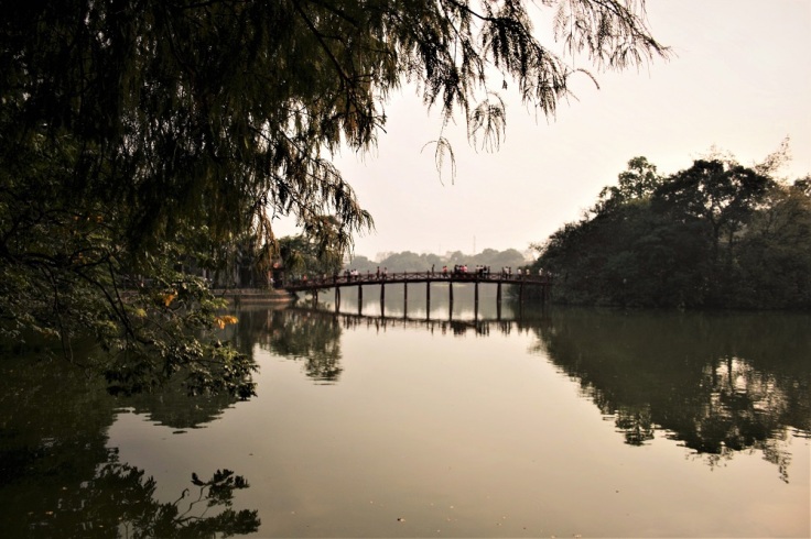 The bridge to the Den Ngoc Son temple on an island in the middle of Hoon Kiem Lake in Hanoi