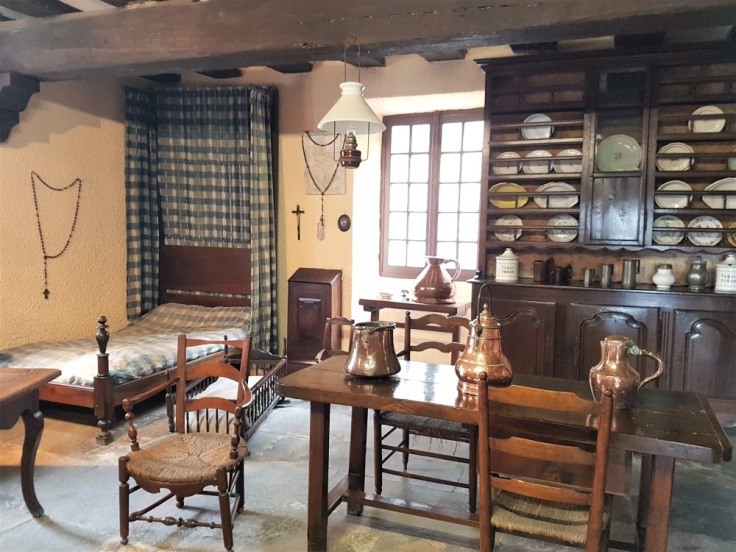 A recreation of a traditional Pyrenean cottage inside the museum at the Chateau-Fort in Lourdes