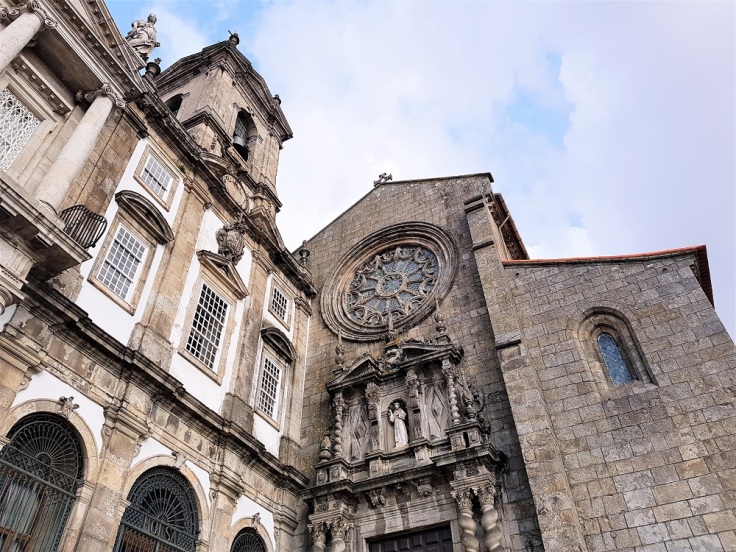 The grey stone exterior of the Igreja de Sao Francisco in the Ribeira district of Porto